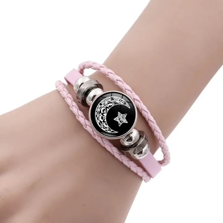 Pink Close-up of sun and moon bracelets worn on wrists showing matching style and adjustable fit.